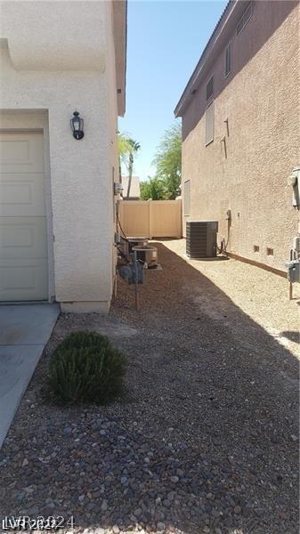 view of property exterior featuring central air condition unit