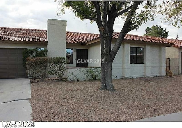 view of property exterior featuring a garage