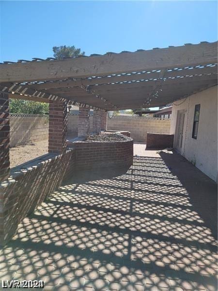 view of patio / terrace featuring a pergola