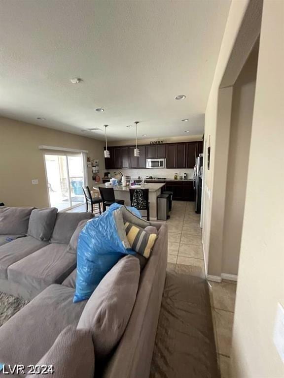 living room featuring light tile patterned flooring