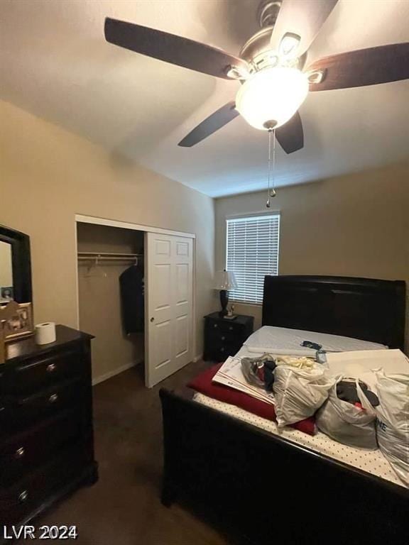 bedroom with ceiling fan and a closet