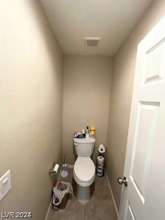 bathroom featuring toilet