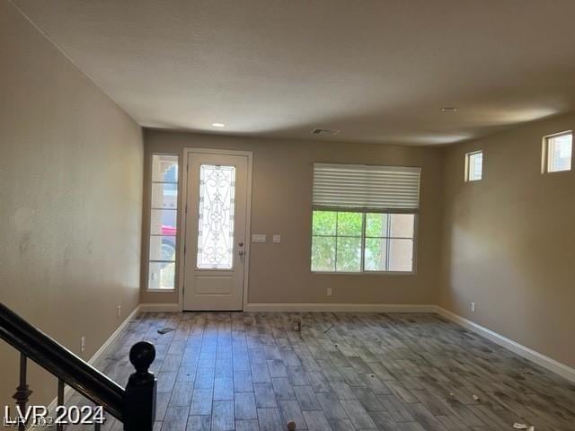 entrance foyer featuring hardwood / wood-style floors