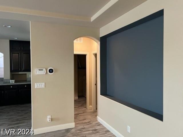 hall with light hardwood / wood-style flooring