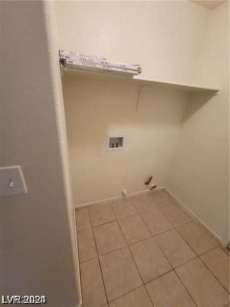 laundry room featuring washer hookup, gas dryer hookup, and light tile patterned flooring