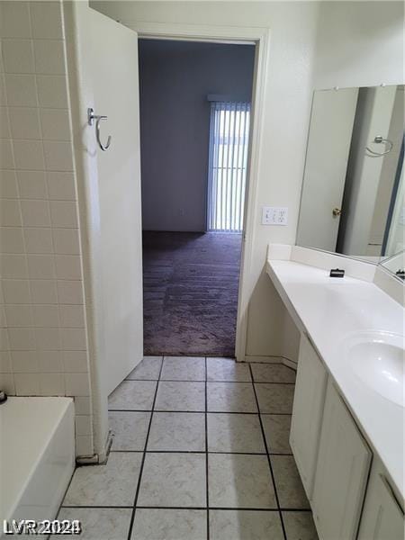 bathroom featuring vanity and tile patterned flooring