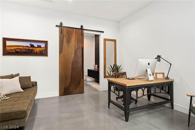 office space featuring a barn door