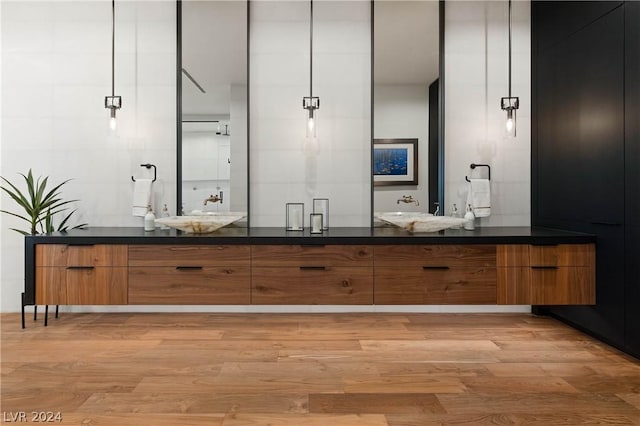 bathroom featuring hardwood / wood-style floors and vanity