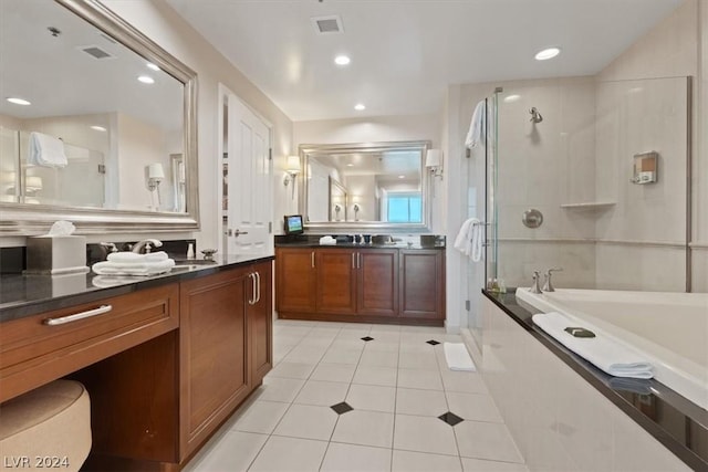 bathroom with vanity, separate shower and tub, and tile patterned floors