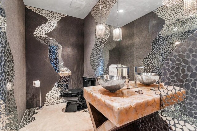 interior space with vanity, toilet, and tile patterned floors