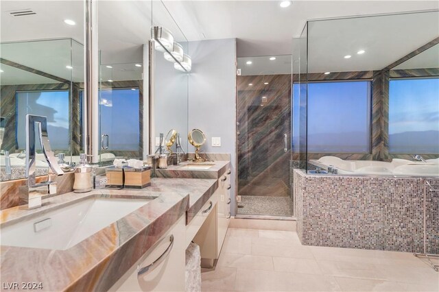 bathroom with shower with separate bathtub, tile patterned floors, and double sink vanity