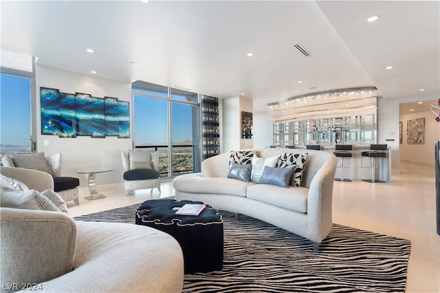 living room with tile patterned floors