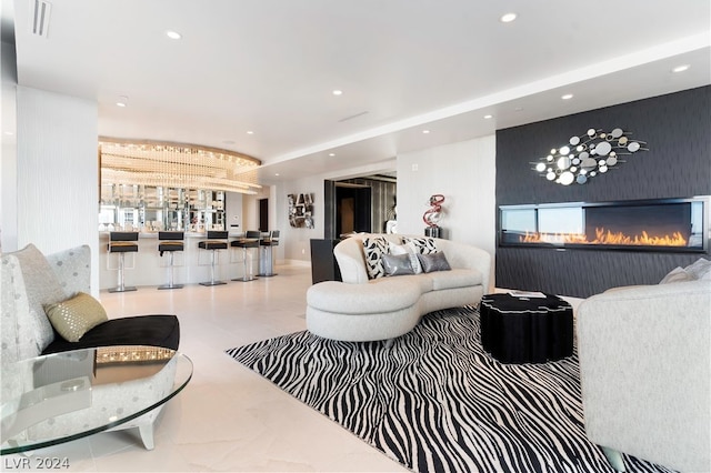 living room with indoor bar and tile patterned floors