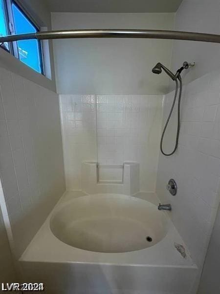 bathroom featuring bathing tub / shower combination