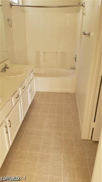 bathroom with tub / shower combination and vanity