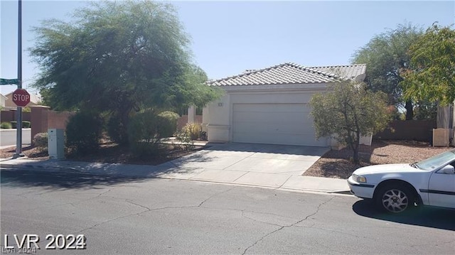 view of front of home with a garage