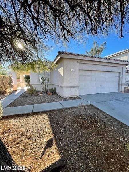 view of property exterior featuring a garage