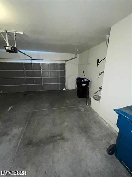 garage featuring a garage door opener