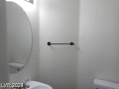 bathroom with sink and toilet