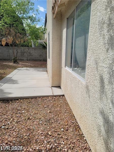 view of property exterior featuring a patio area