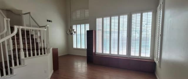 doorway featuring plenty of natural light and hardwood / wood-style flooring