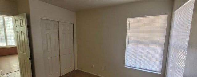 unfurnished bedroom featuring a closet