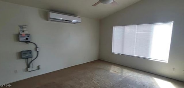 clothes washing area featuring ceiling fan and a wall mounted AC