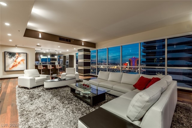 living room featuring dark hardwood / wood-style floors