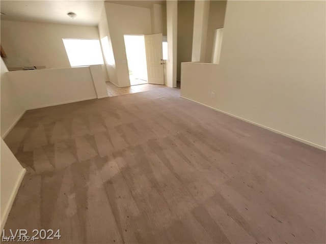 spare room featuring light hardwood / wood-style floors