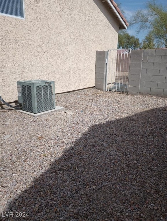 view of property exterior with central air condition unit