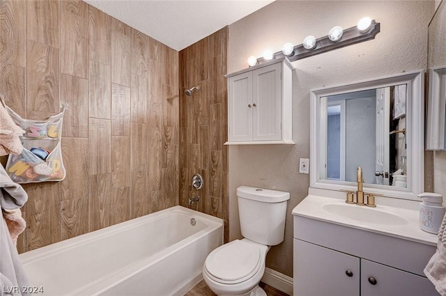 full bathroom featuring shower / bathing tub combination, vanity, and toilet