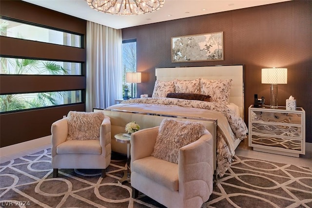 bedroom featuring an inviting chandelier