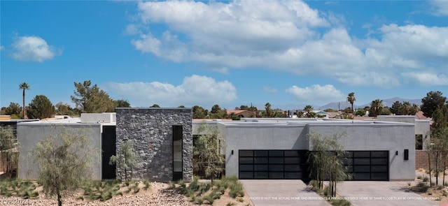 contemporary house featuring a garage