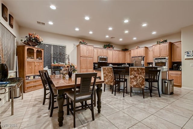 dining room featuring recessed lighting, visible vents, and light tile patterned floors