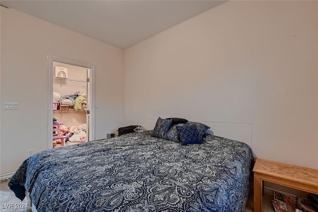 bedroom featuring carpet