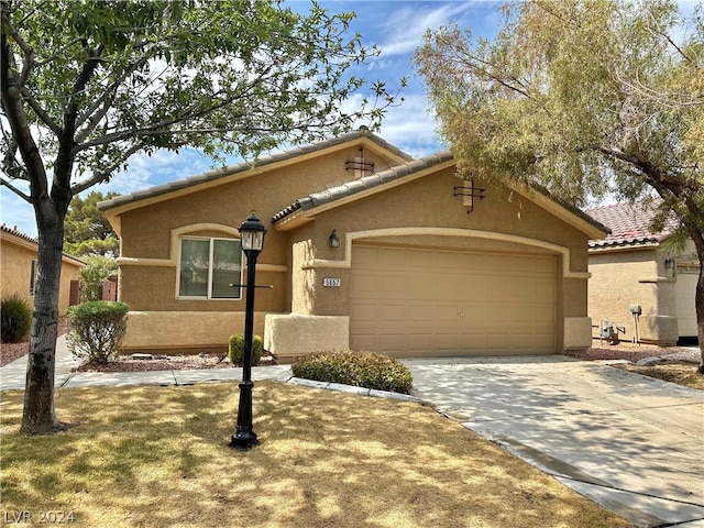 view of front of property with a garage