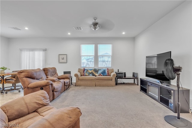 living area with recessed lighting, visible vents, ceiling fan, and carpet flooring