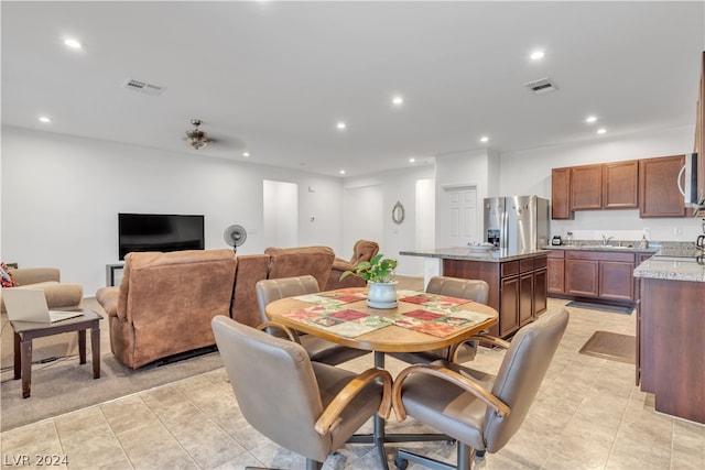 dining space featuring light tile patterned floors, visible vents, and recessed lighting