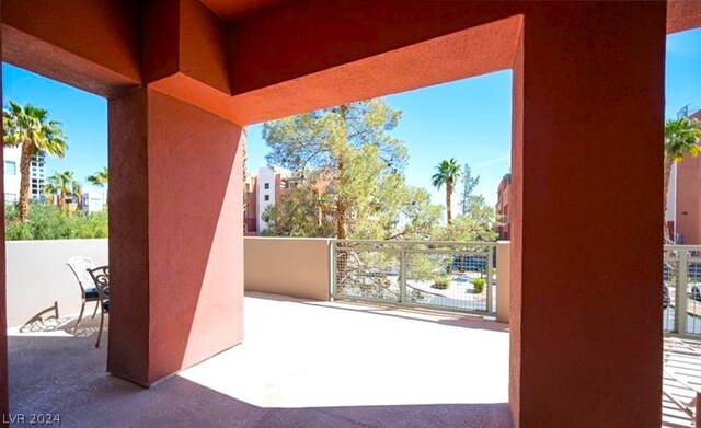 view of patio / terrace with a balcony