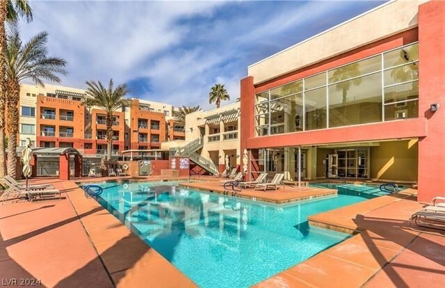 view of pool with a patio area