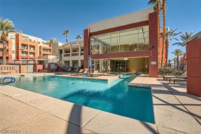 view of pool featuring a patio area