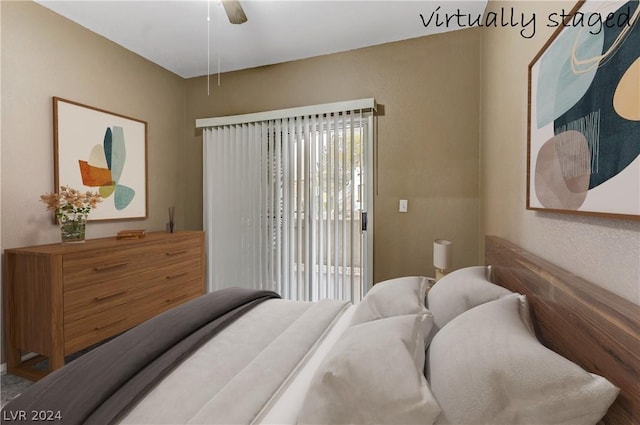 bedroom with access to exterior and ceiling fan