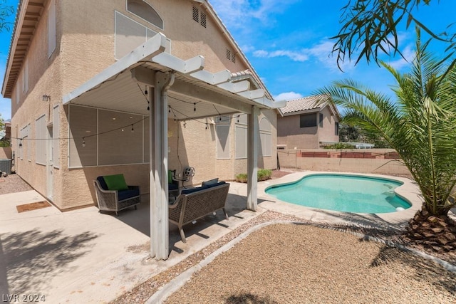 view of pool featuring an outdoor living space, a patio area, central AC, and a pergola