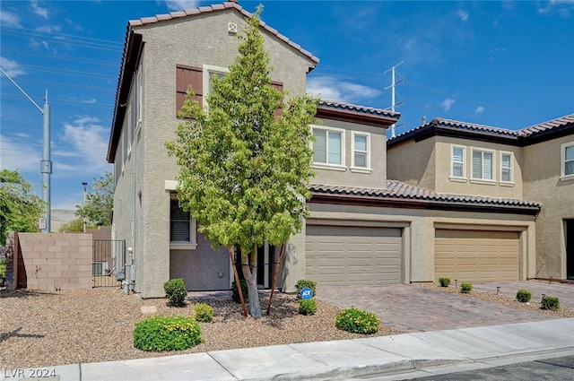 view of front of home with a garage