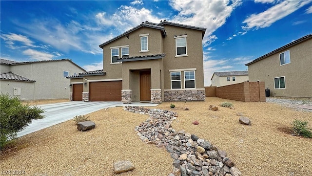 view of front of property with a garage