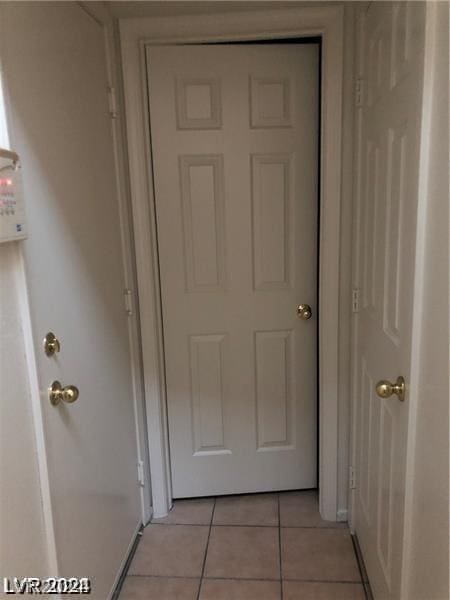 doorway to outside featuring light tile patterned floors