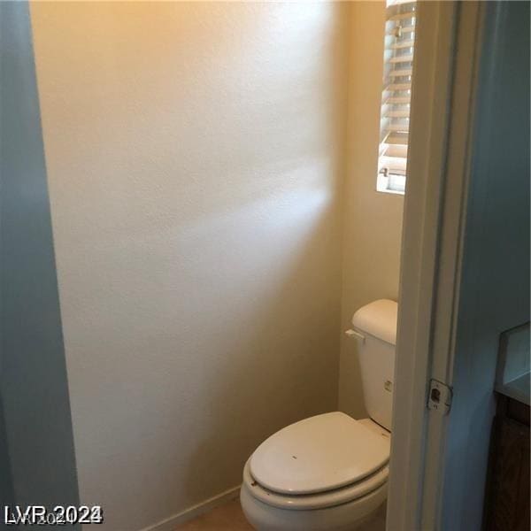 bathroom featuring toilet