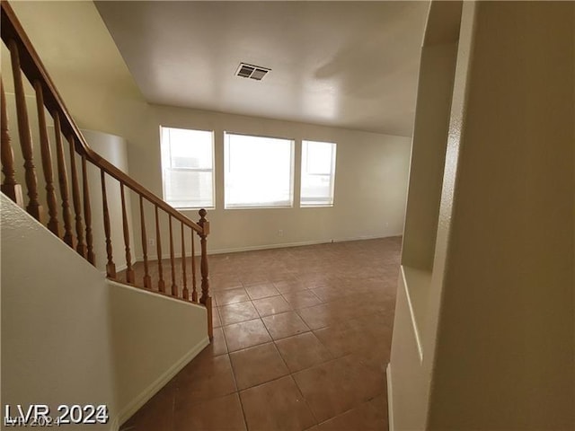 entrance foyer featuring tile patterned floors