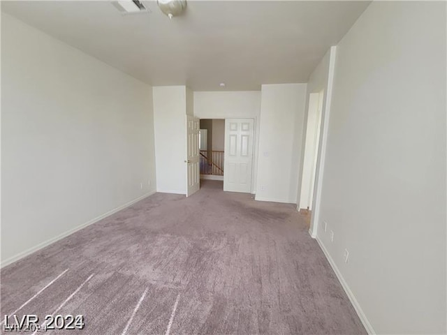 spare room with carpet