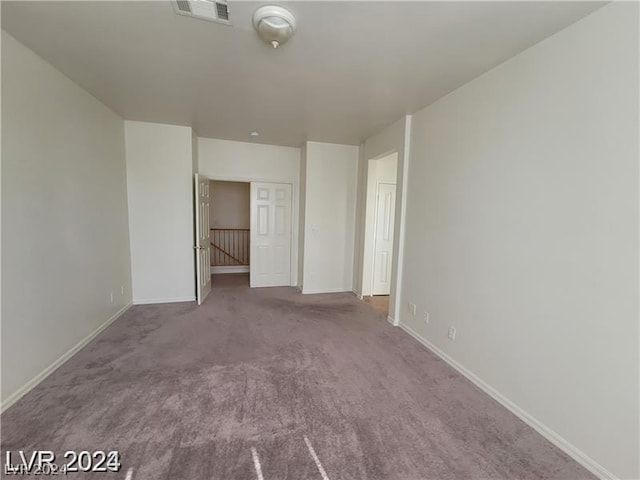 unfurnished bedroom with carpet floors